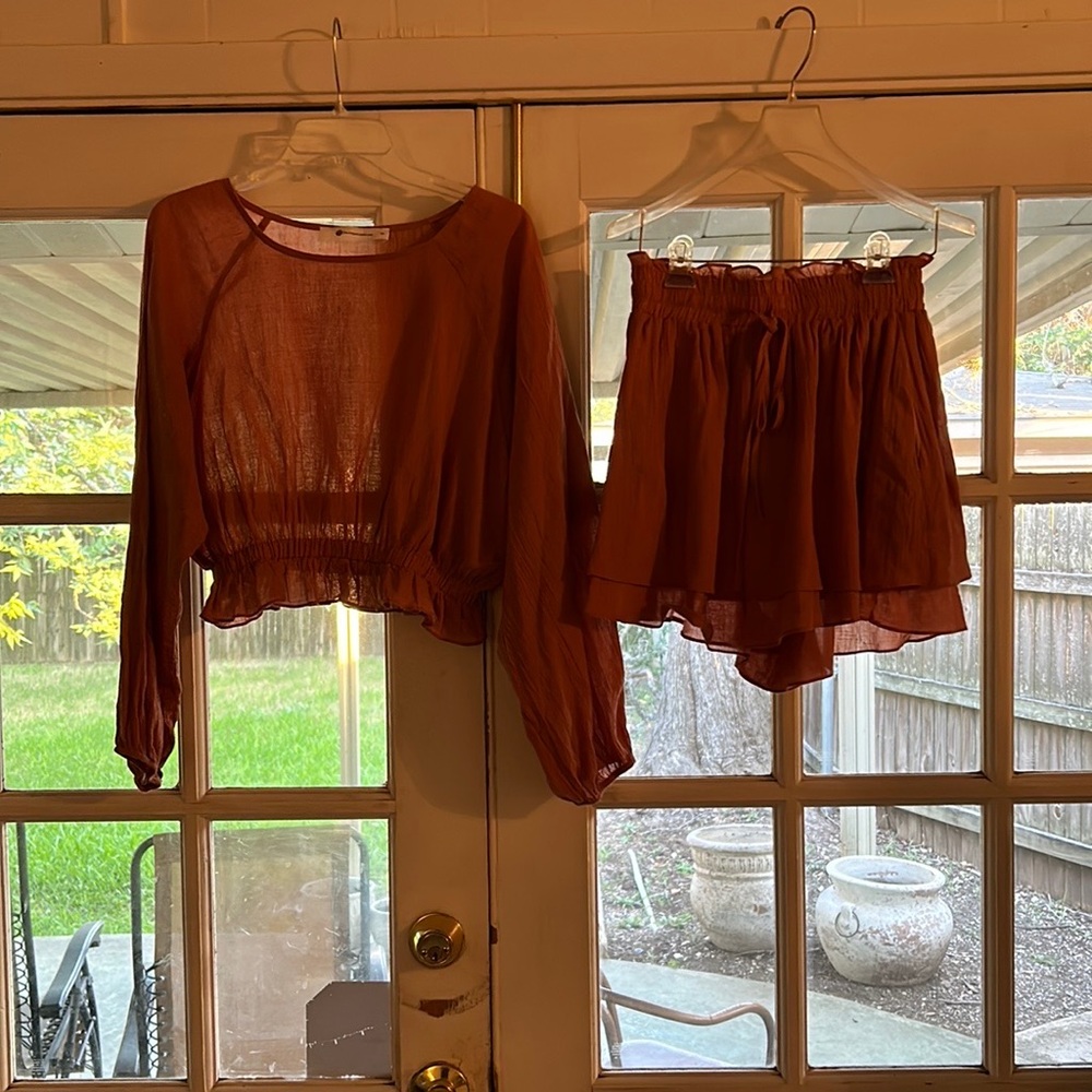The Impeccable Pig Skort Set. Size medium. Color: terracotta.